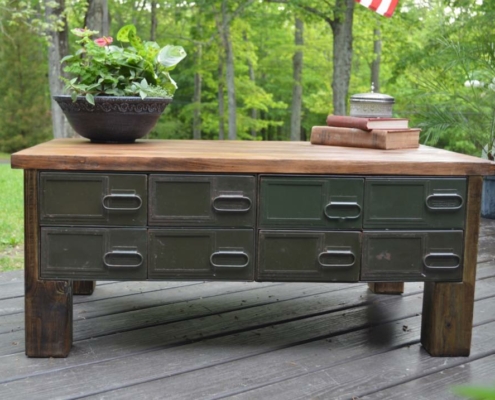 a table with drawers and a bowl on top