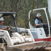 a man operates a bobcat