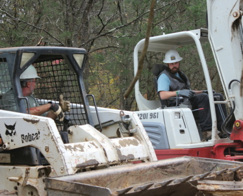 a man operates a bobcat