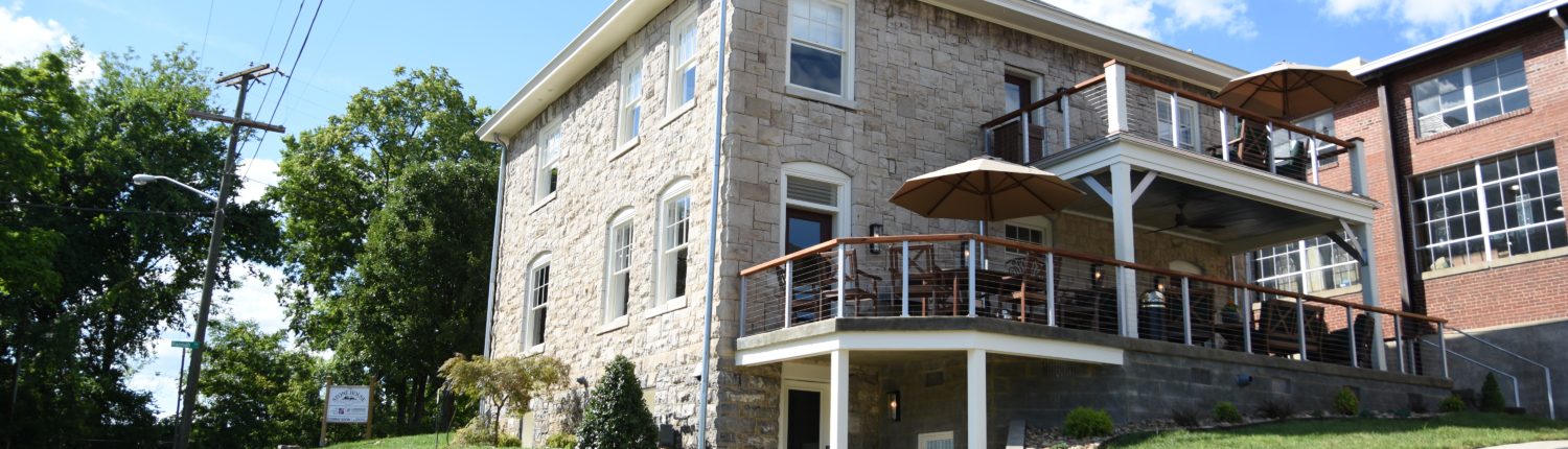 The backyard balconies of Black Dog Salvage's Stone House rental property